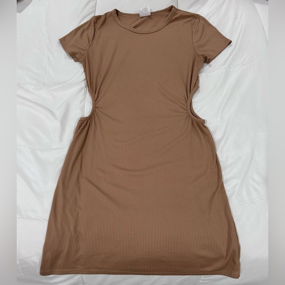 Tan color dress.